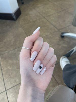 White acrylic with black heart OBSESSED  Did a great job on my cuticles - he didn't overlap them and made sure everything was clean  11/10