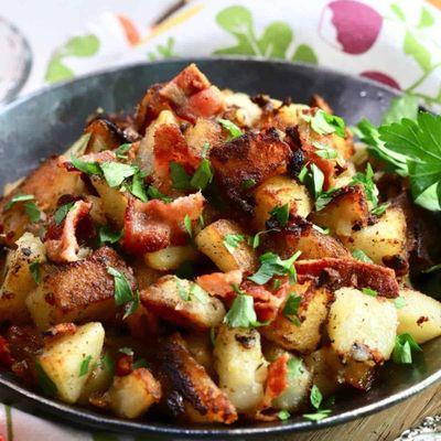 Home fries with onions and parsley. This dish is prepared every day from scratch.