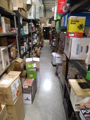 Inside the warehouse, you'll find cramped and crowded shelves full of all sorts of things.