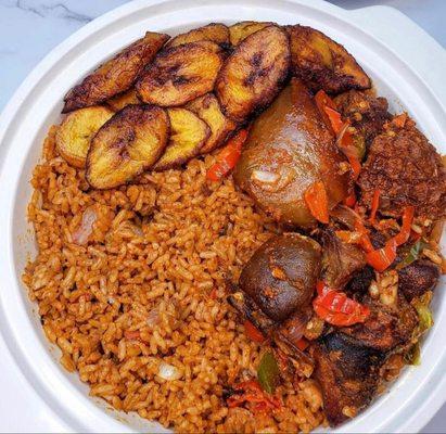 Jellof rice with goat meat and fried plantain