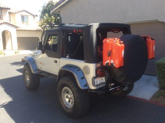 Five gallon Jerry Cans, and full size spare tire setup!