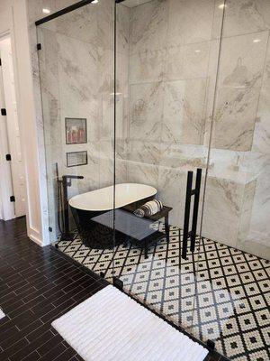 Marble surround with tile flooring