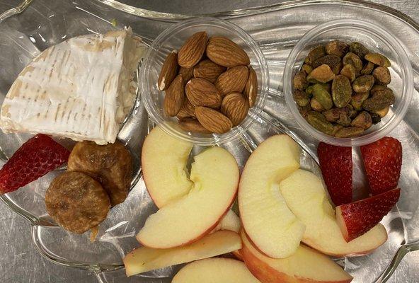 Delicious Brie/Fruit/Nut small plate.