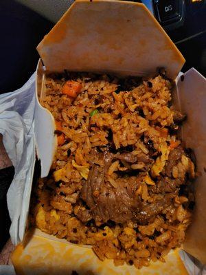 I ordered spicy beef fried rice with Sriracha. It comes with real beef flank not that gray rubbery stuff