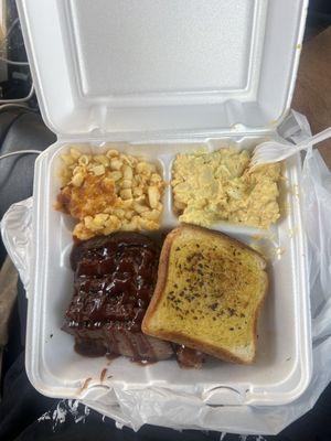 Plate with mac and cheese and potato salad