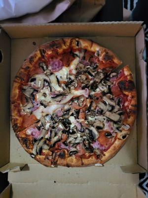 Pepperoni,  mushroom,, and onion pizza