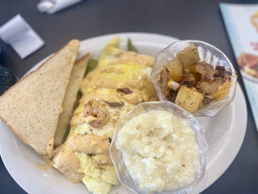 Shrimp Southwestern Omelette with Breakfast Potatoes and Side Grits