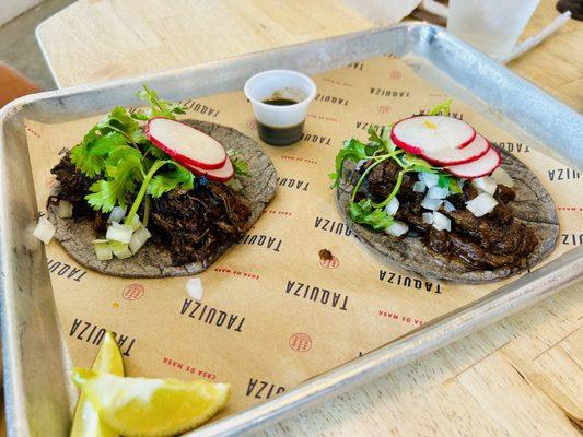 Barbacoa (left) & carne asada (right) tacos