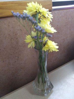 Fresh flowers on each table