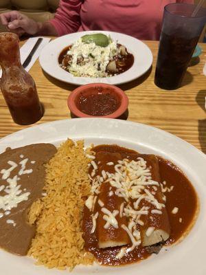 Great enchiladas, rice and beans,