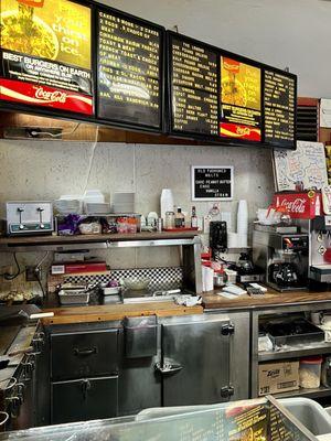 Coffee, a rotary phone and a flat top grill that's probably as old as your grandmother so you know it's making the best food