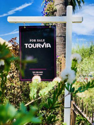 Tourvia For Sale Sign in its Natural Habitat.