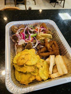 This is our party starter Fritay Platter! It comes with Griot or Turkey, Akra, plantains, and fried Yuca