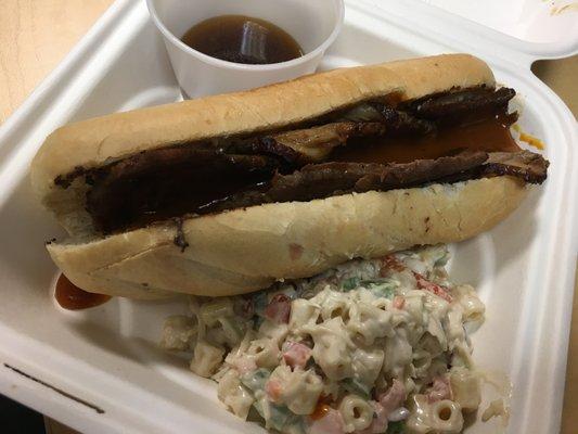 French dip with a macaroni salad. The bun was soft and supple.