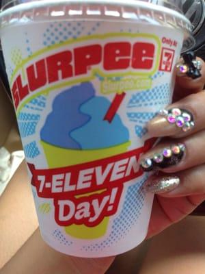 My free slurpee, the cups are bigger this year! Score!