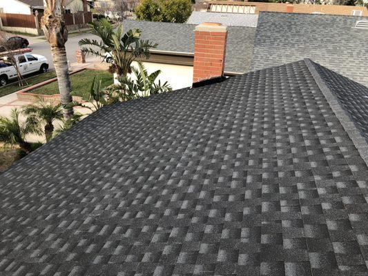 Beautifully installed and set to last a lifetime! Timberline HD Charcoal Shingle with Golden Pledge Warranty.