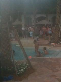 Gigantic college party, driving my kids and I out of the pool we pay astronomical prices to enjoy. NO MANAGEMENT HERE!!!