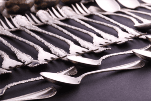 We buy sterling silver flatware stamped with "Sterling" or "925", and flatware with other purities such as "800" or "Coin" silver.