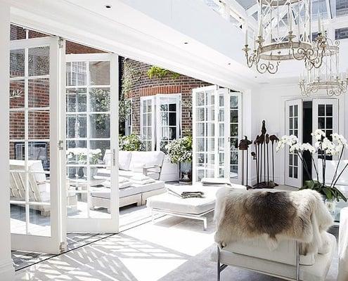 All white décor. French Doors for indoor/outdoor living.