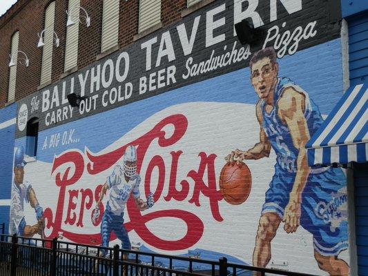 Celebrating ISU sports mural on the side of the Tavern by Michael Neary