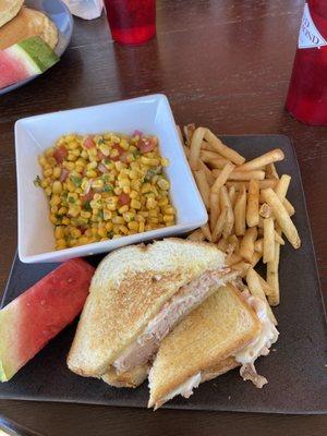 Grilled turkey and provolone sandwich with corn salsa