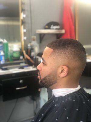 #1 & a Half on top of the head with a bald fade on the sides and also a faded beard into the bald fade...