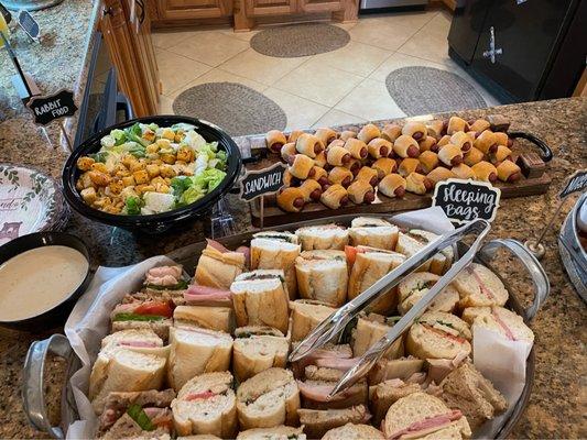 Catering 16 half sandwiches and small Caesar