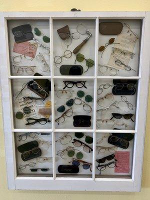 Antique eye wear collection Dr Lynn Johnson has displayed - cool