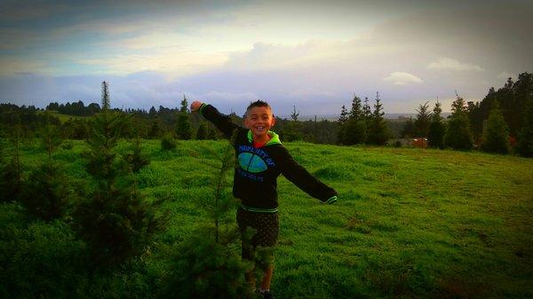 My oldest with his favorite tree!