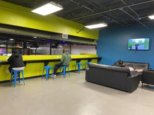 Parents lounge with bar overlooking play area