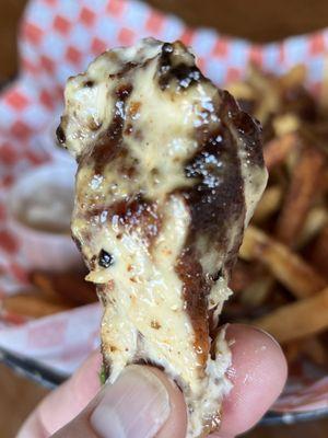 House-smoked wings tossed in Alabama white sauce, and dill. The best wings around.