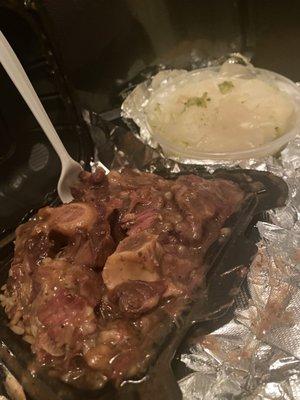 Oxtails, rice & peas and cabbage