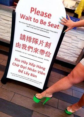 Please wait to be seat (ed)