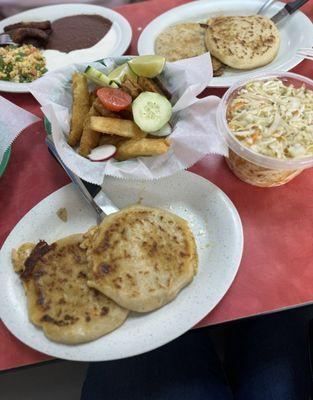 Breakfast plate, pupusas revueltas and yuca con chicharrón