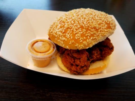 Huge Buttermilk Chicken Sandwich (08/01/2016 special).  Normally comes with pickles and custom sauce on sandwich...