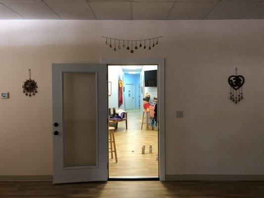 In the yoga room looking out towards the lobby and hallway.