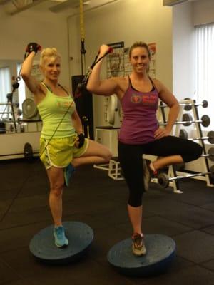 carm (trainer) Erin (client) -a little yoga, resistance.. a little magic! all about the core! We have fun!