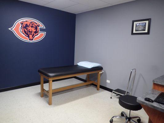 Our privatized examination room, featuring the Chicago Bears logo, for the safety of the patient.