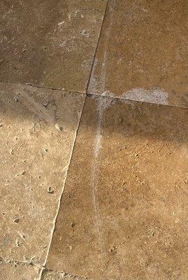 Deep gouges in pavers caused by this company / dragging furniture across.