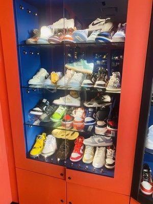 Another display with shoes stacked up.on to of each other