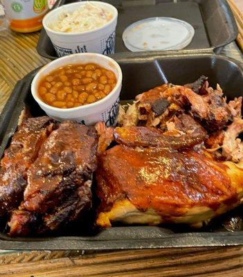 Meat platter. Comes with chicken, ribs, pulled pork, and 2 sides