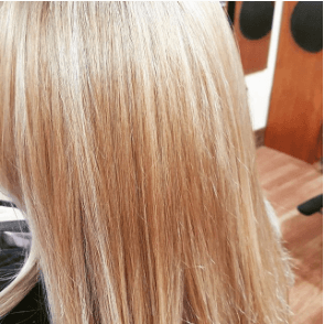 Beautiful Blonde with highlights by Renee