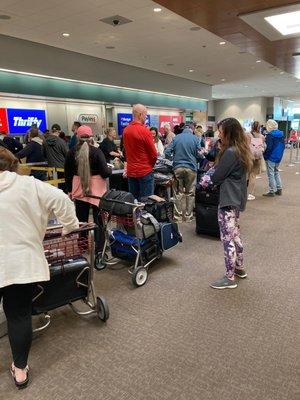 This is the line at thrifty car rentals. One person working.