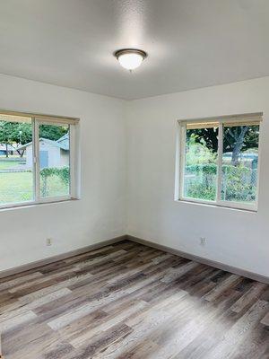 Bedroom After - New Windows & frames, repaining, flooring and base boards, doors.