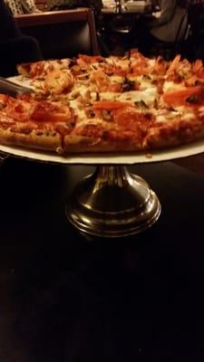 Elegantly served.  Best pizza!