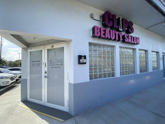 Door and side of Clips Beauty Salon