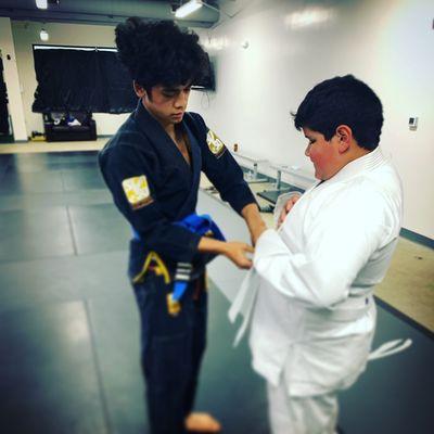 Teaching the importance of how to tie your belt