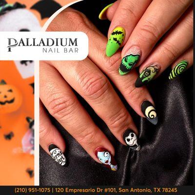 Ready to unleash my inner ghoul with these spooky-chic nails! A little glam, a little fright--perfect for a Halloween night out.