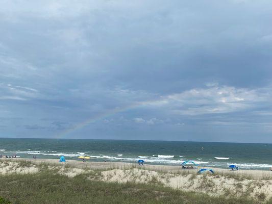 See the dark blue umbrella?  That's our space or and look even the rainbow approves!