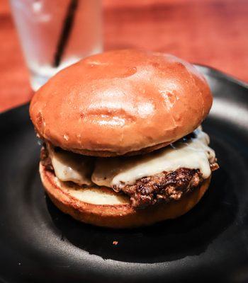 Truffle Burger -
 Truffle aioli, Swiss cheese, organic Japanese mushrooms. We use 100% Kauai grass-fed beef.